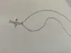Influential new silver necklace, light luxury and elegant cross S925 silver necklace Application Scenario